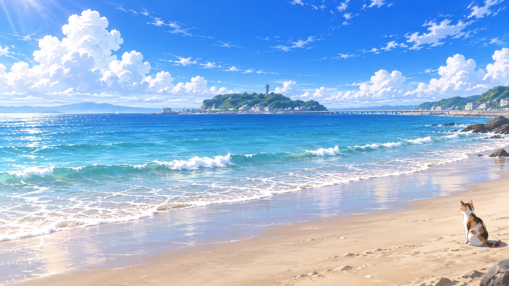 青い海と江ノ島を望む砂浜